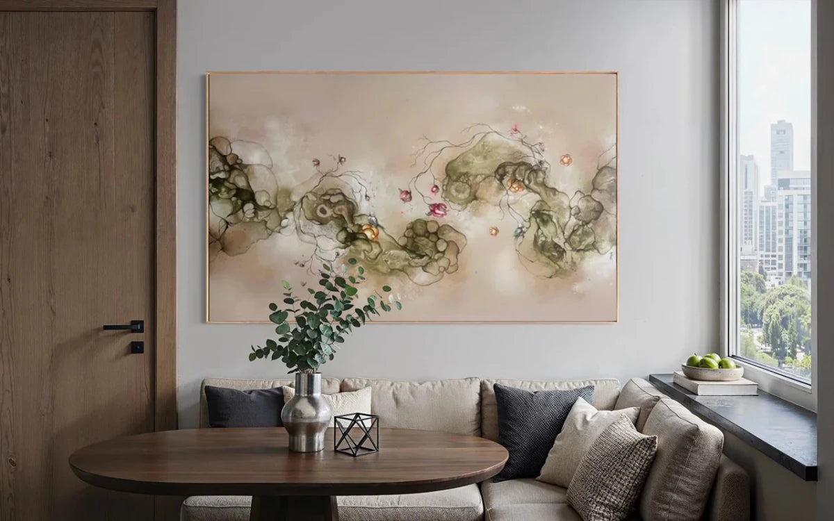 Stort abstrakt naturmaleri 110x180 cm over sofa i lys skandinavisk stue af Rikke Darling