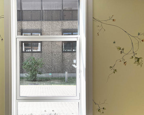 Vægmaleri Ronald McDonald House Rigshospitalet i København. Indretning af fællesrum med moderne kunst.